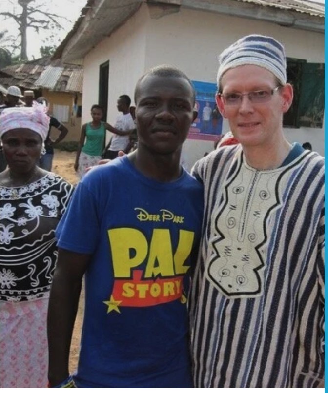 John Oliphant with a community member during a documentary shoot
